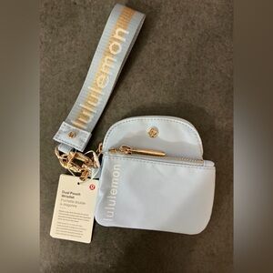 lululemon athletica Light Blue Wristlet with Gold Accents